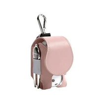 Load image into Gallery viewer, Pink mini leather golf ball pouch with snap closure and clip, perfect for holding golf balls and tees during a round on the course.
