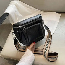 Load image into Gallery viewer, Vintage leather crossbody shoulder bag with striped strap on chair, showcasing stylish design and functionality
