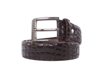 Charger l'image dans la galerie, A dark brown crocodile-embossed leather belt with a silver-tone metal buckle, coiled and presented on a solid white background.
