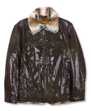 Load image into Gallery viewer, A dark brown textured leather jacket with a contrasting brown and white faux fur collar, displayed against a plain white background.
