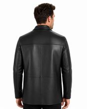 Charger l'image dans la galerie, A man viewed from the back wearing a black leather jacket, showing the back panel stitching and collar, against a plain white background.
