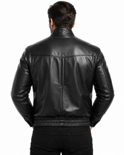 Load image into Gallery viewer, A man viewed from the back wearing a black leather jacket with a high collar and ribbed hem, paired with black pants, against a plain white background.

