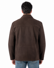 Charger l'image dans la galerie, A man viewed from the back wearing a dark brown suede or nubuck jacket with a collar, paired with blue jeans, against a plain white background.
