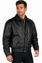 Load image into Gallery viewer, A man wearing a black REED genuine cow leather bomber jacket

