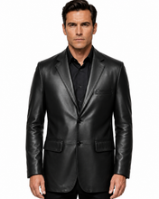Charger l'image dans la galerie, A man wearing a black leather blazer over a black button-down shirt, photographed against a solid white background.
