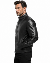 Load image into Gallery viewer, A man wearing a black leather jacket, shown in profile against a plain white background.
