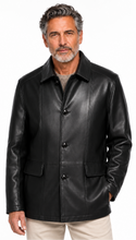 Cargar imagen en el visor de la galería, A man wearing a black leather jacket with a collar, three-button front closure, and flap pockets, paired with light beige pants, against a plain white background.
