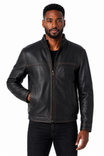 Cargar imagen en el visor de la galería, A man wearing a black leather jacket with a full-zip front, stand-up collar, and zippered side pockets, photographed against a plain white background.
