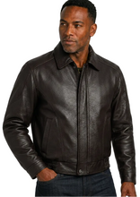 Load image into Gallery viewer, A man wearing a brown Reed cow leather jacket with a collar, front zipper, and snap-button hem, photographed against a plain white background.
