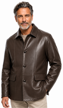 Cargar imagen en el visor de la galería, A man wearing a dark brown leather jacket with a button-up front, collar, and flap pockets, paired with beige pants, photographed against a plain white background.
