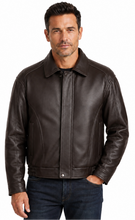 Load image into Gallery viewer, A man wearing a dark brown leather jacket with a snap-button front and pointed collar, paired with dark blue jeans, photographed against a plain white background.
