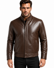Load image into Gallery viewer, A man wearing a dark brown leather jacket with a stand-up collar, zippered front, and two front flap pockets, photographed against a plain white background.
