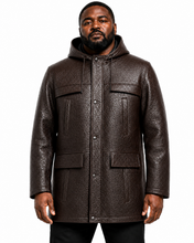 Charger l'image dans la galerie, A man wearing a dark brown textured faux-leather hooded jacket with snap-button front and flap pockets, photographed against a plain white background.
