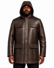 Charger l'image dans la galerie, A man wearing a dark brown textured faux-leather hooded jacket with snap buttons and flap pockets, shown against a plain white background.

