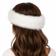Charger l'image dans la galerie, A white faux fur headband worn by a model, shown from the back. The model has long, wavy brown hair and is wearing a white knit top against a solid white background.
