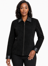 Charger l'image dans la galerie, A woman modeling a black suede jacket with black suede-leather trim on the collar, cuffs, and zipper, paired with black pants against a plain white background.
