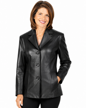 Charger l'image dans la galerie, A woman wearing a black real-leather blazer with notch lapels and three front buttons, shown against a plain white background.

