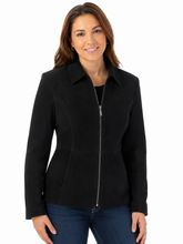 Cargar imagen en el visor de la galería, A woman wearing a black zip-front jacket with a collar and long sleeves, paired with blue jeans, photographed against a plain white background.
