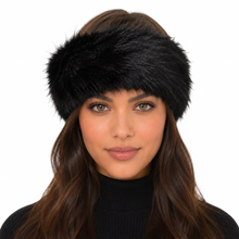 Charger l'image dans la galerie, A woman wearing a thick, fluffy black faux fur headband against a solid white background.
