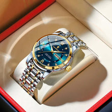 Cargar imagen en el visor de la galería, Luxury men&#39;s watch with gold and silver detailing, featuring a blue dial, showcasing elegance and precision in a stylish presentation box.
