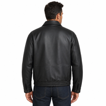 Load image into Gallery viewer, Back of A man wearing a black REED genuine cow leather bomber jacket with white background
