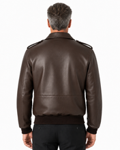 Charger l'image dans la galerie, Back view of brown REED Men's Bomber Leather Jacket, union-made in USA, showcasing durable naked cow leather and classic design.
