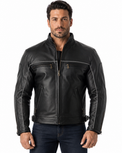 Charger l'image dans la galerie, Black vented leather motorcycle jacket with light reflector, worn by a model. Features air vents and adjustable straps for comfort and safety.
