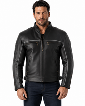 Charger l'image dans la galerie, Black vented leather motorcycle jacket with light reflector, worn by a model. Features air vents and adjustable straps for comfort and safety.
