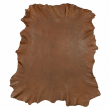 Cargar imagen en el visor de la galería, Brown reed sheepskin leather hide on a white background
