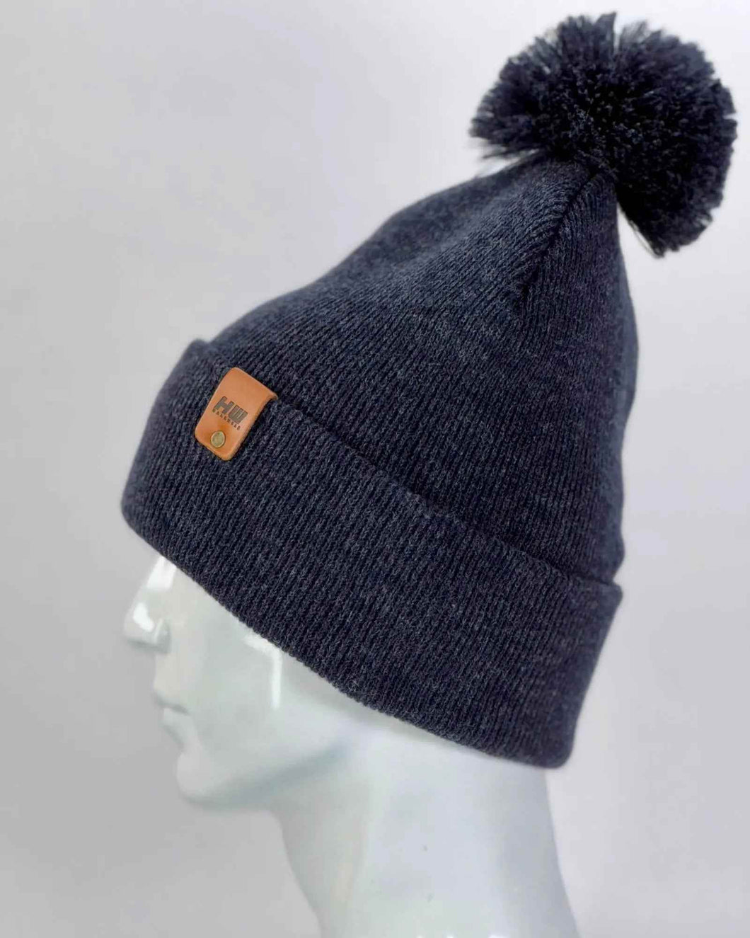 CPP1 HAAKWEAR PomPom Beanie - Made in USA - Denim Blue displayed on a mannequin, showcasing high-quality material and pom-pom detail.
