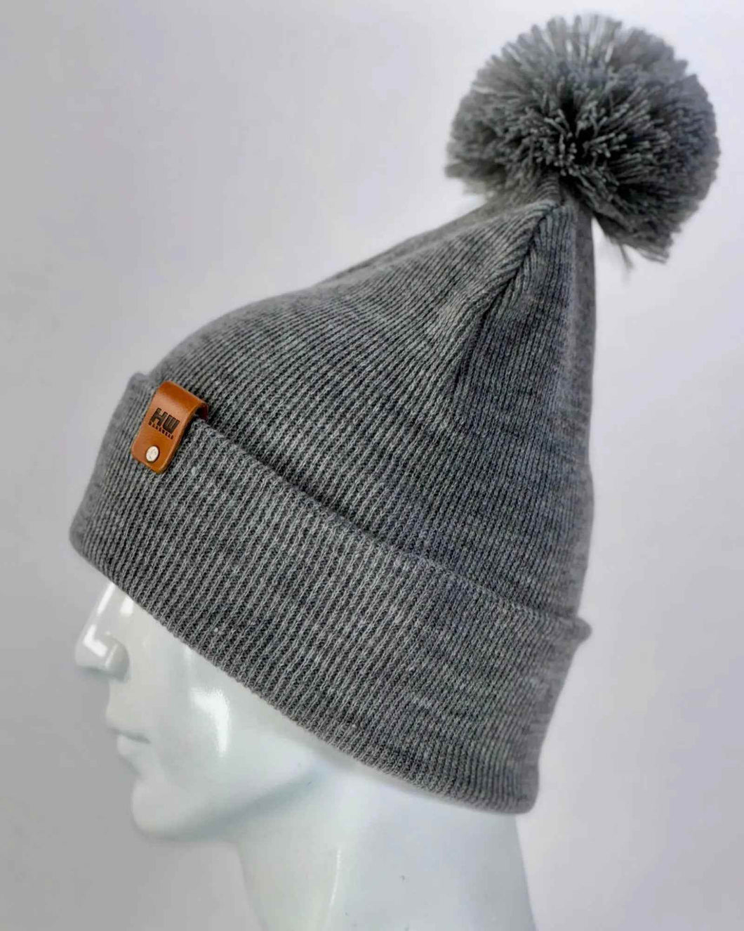 CPP1 HAAKWEAR PomPom Beanie - Made in USA - Koala Gray, featuring knit design and pom pom detail, shown on a mannequin head.