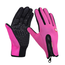 Load image into Gallery viewer, Pink touchscreen compatible unisex gloves with a black non-slip grip, perfect for keeping hands warm and connected to devices in cold weather.
