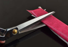 Load image into Gallery viewer, eZthings heavy duty scissors cutting pink fabric, ideal for arts, crafts, and upholstery projects, with sharp precision blades.
