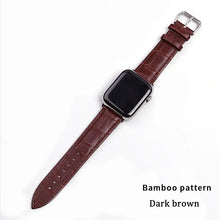 Charger l&#39;image dans la galerie, Dark brown bamboo pattern leather band for Apple Watch with buckle clasp, shown on a white background.
