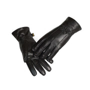 A pair of black Reed women's genuine leather warm lined driving gloves with a leather bow tie.