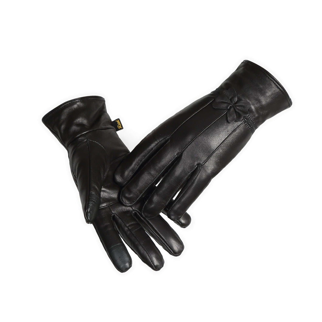A pair of black Reed women's genuine leather warm lined driving gloves with a leather bow tie.
