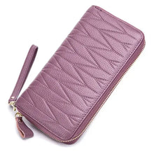 Load image into Gallery viewer, Purple leather female travel purse with wrist strap, perfect for organizing essentials stylishly on the go.
