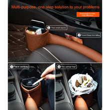 Load image into Gallery viewer, Multi-functional vegan leather car seat gap filler with storage pockets, ashtray, and trash bag holder for organized car interiors.

