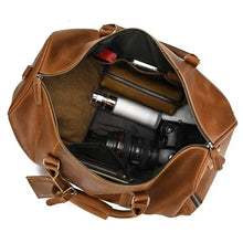 Load image into Gallery viewer, The Dagny Weekender | Large Leather Duffle Bag, open with interior view showing organization compartments and travel essentials.
