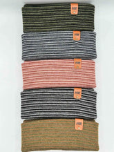 Load image into Gallery viewer, Various colors of HAAKWEAR Traditional Contrast Cuffed Beanie/ Hat - Black / Gray, Made in USA, displayed in a stack.
