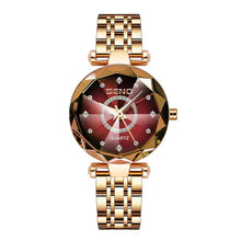 Cargar imagen en el visor de la galería, Elegant quartz watch with a gold stainless steel band and a detailed red dial, designed for style and durability with water resistance.
