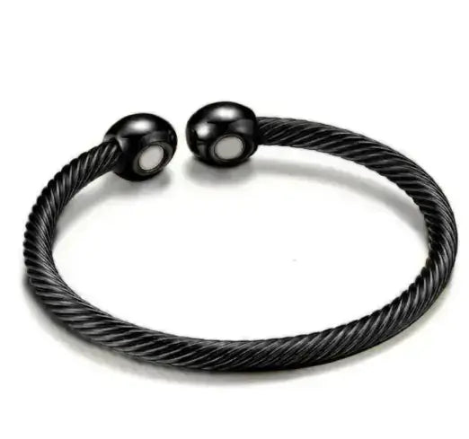 Stylish black magnetic bracelet with a twisted design and magnetic therapy benefits.