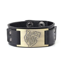 Load image into Gallery viewer, Vintage wide leather woven bracelet with an intricately crafted wolf head centerpiece, symbolizing strength and independence.
