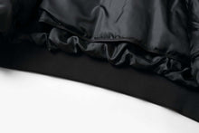 Load image into Gallery viewer, Close-up of REED Men&#39;s Premium Leather Aviator Bomber Jacket&#39;s interior lining and knit cuffs, showcasing durable construction.
