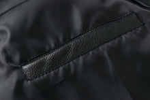 Load image into Gallery viewer, Close-up of REED Men&#39;s Premium Leather Aviator Bomber Jacket pocket detail showcasing durable, high-quality imported leather.

