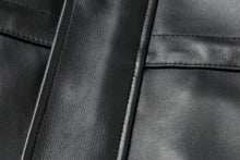 Load image into Gallery viewer, Close-up of REED&#39;s classic men&#39;s car coat in imported lamb leather with zip-out lining, showing premium design and smooth texture.
