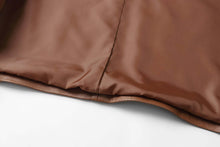 Load image into Gallery viewer, Close-up of the interior lining of REED Men&#39;s Premium Lambskin Leather Blazer showcasing its soft-touch craftsmanship.
