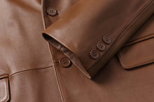 Load image into Gallery viewer, Close-up of REED Men&#39;s Premium Lambskin Leather Blazer showcasing soft-touch lambskin, buttons, and stitching details.
