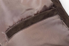 Load image into Gallery viewer, Close-up of satin-lined pocket on REED Men&#39;s Baseball Suede Leather Jacket, showcasing soft suede and durable stitching.
