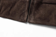 Load image into Gallery viewer, Close-up of REED Men&#39;s Baseball Suede Leather Jacket in dark brown, showcasing soft suede texture and detailed stitching.

